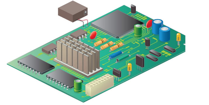 Uma variedade de capacitadores (mostrados a cores) numa placa de circuito.
