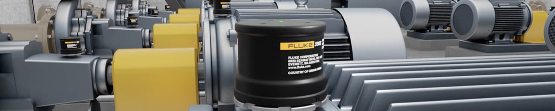 A Fluke vibration sensor conducts vibration measurement on a piece of rotating machinery.