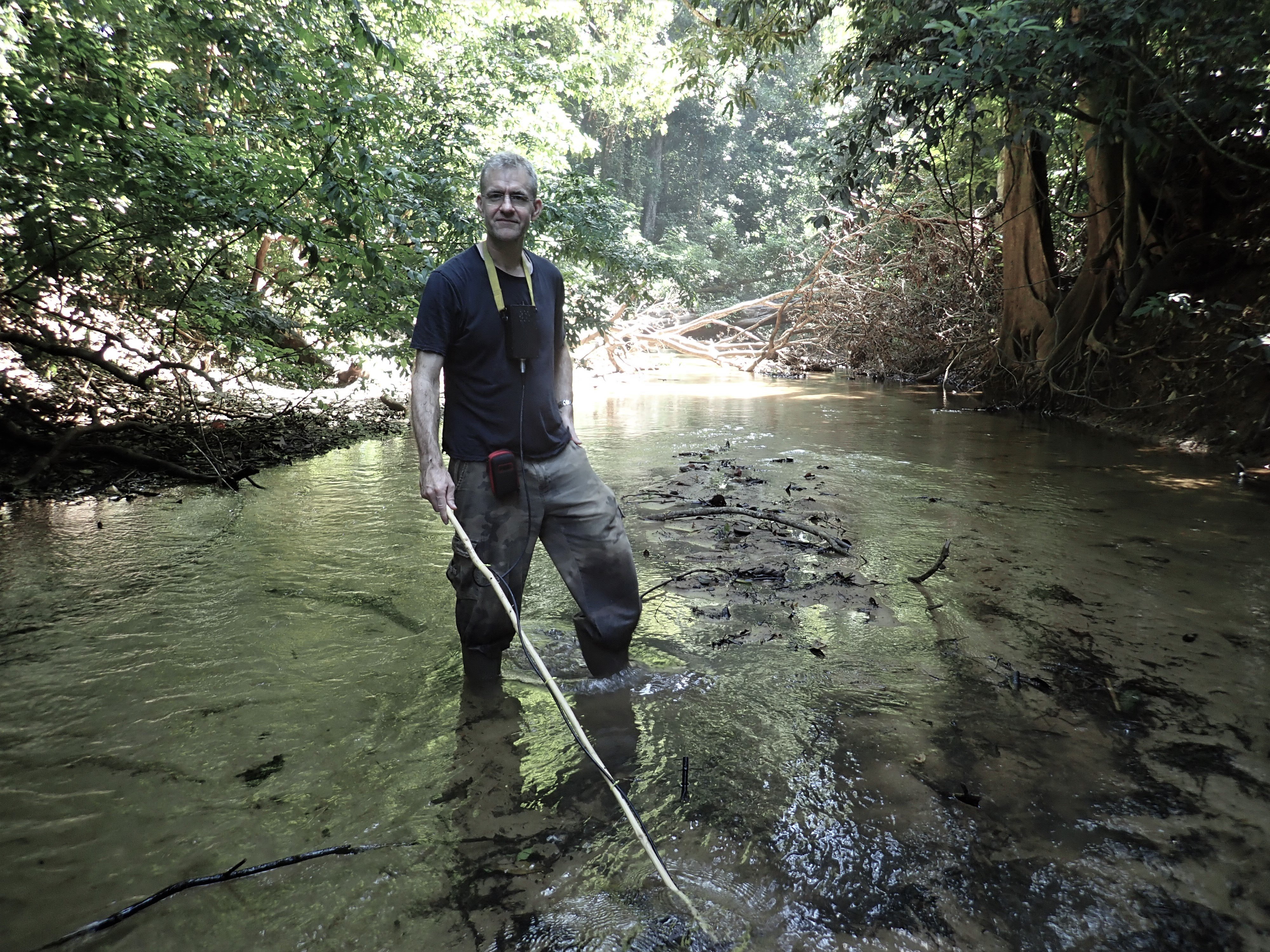 Professor Crampton uses a fishfinder to locate electric eels in the Amazon.