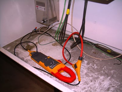 Fluke 381 Clamp Meter is used to record the amperage reading
