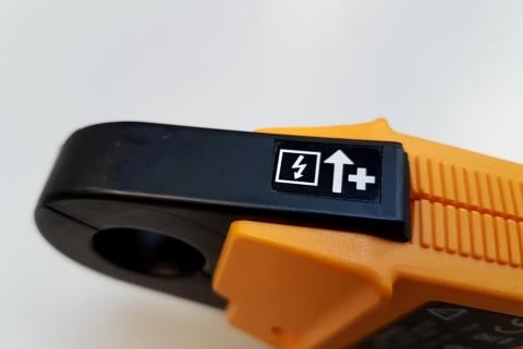 Why is there an arrow on your current clamp? | Fluke