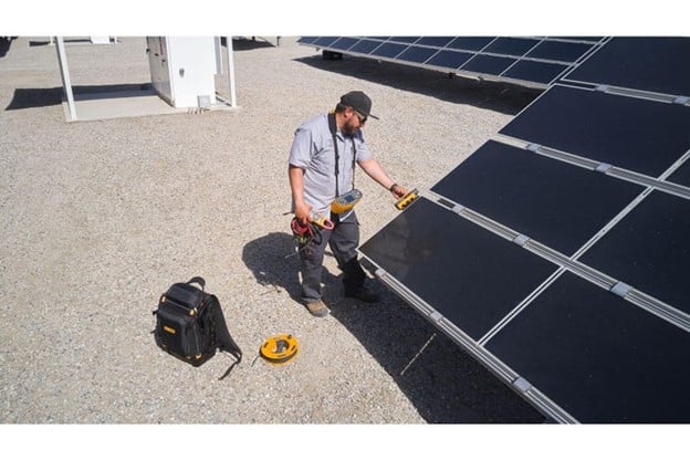 Mounting the Fluke Wireless IRR2-BT Solar Irradiance Meter to a panel.